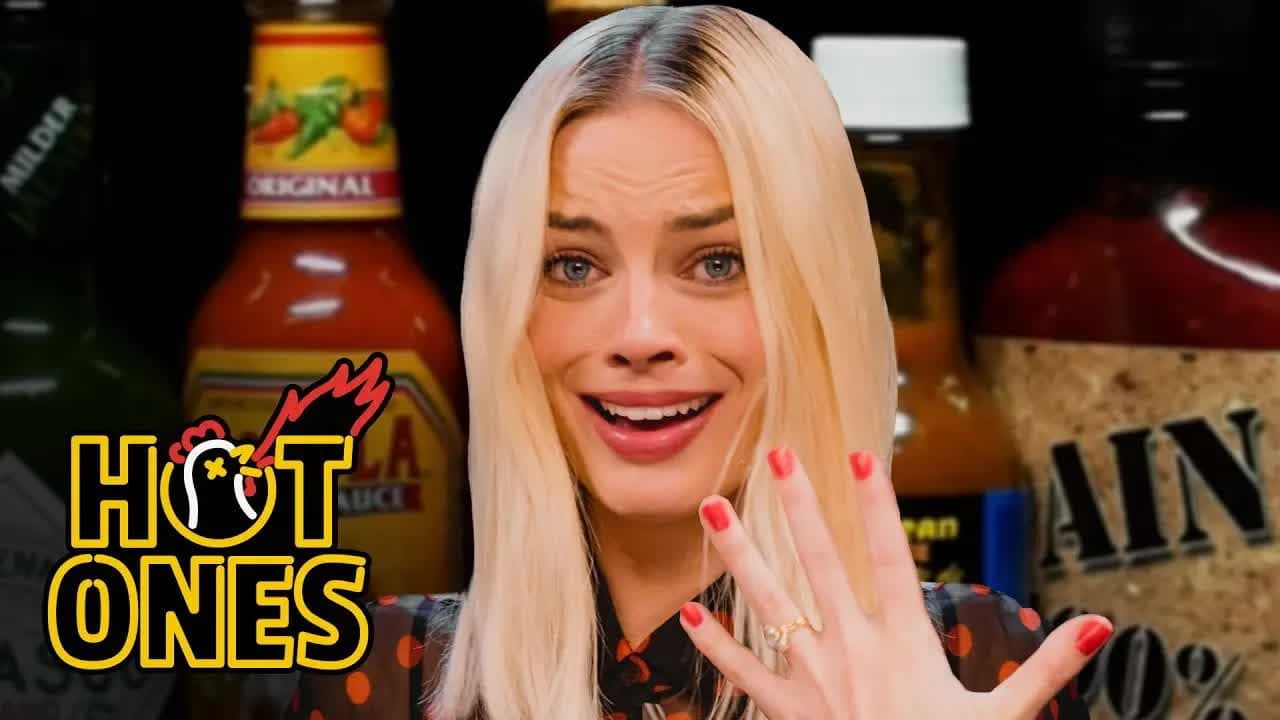 Margot Robbie Pushes Her Limits While Eating Spicy Wings still