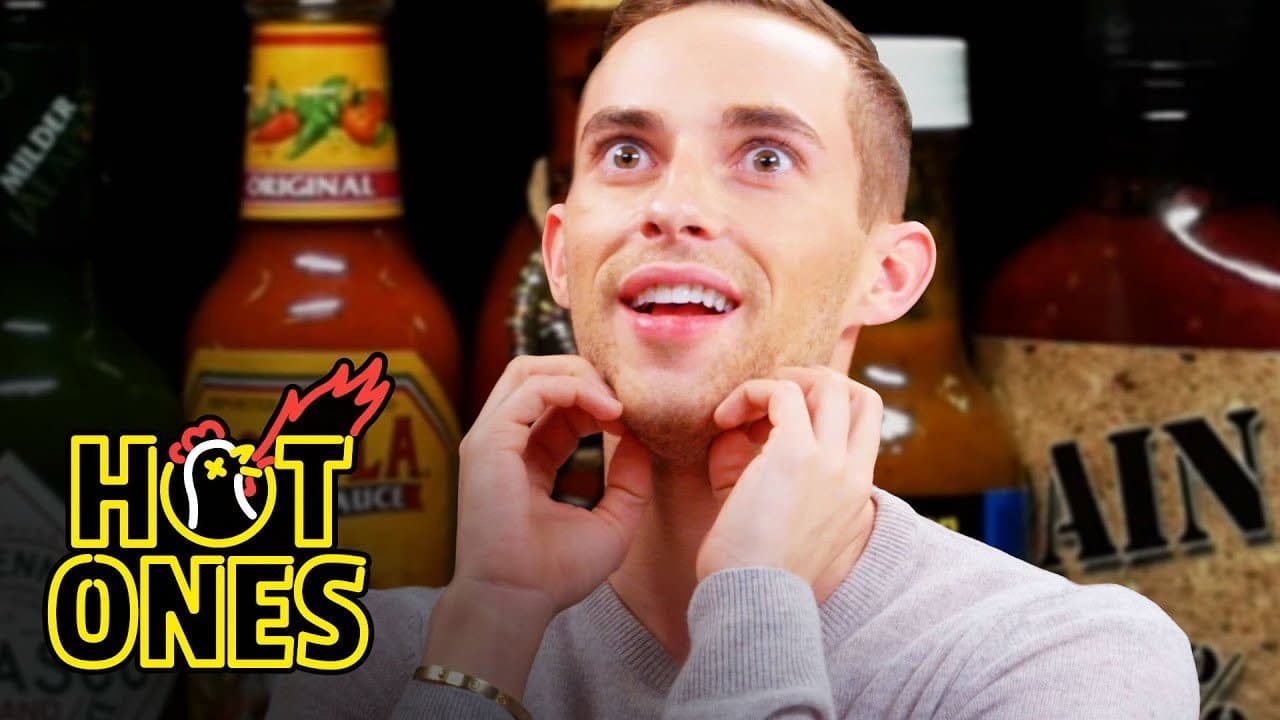 Adam Rippon Competes in the Olympics of Eating Spicy Wings still