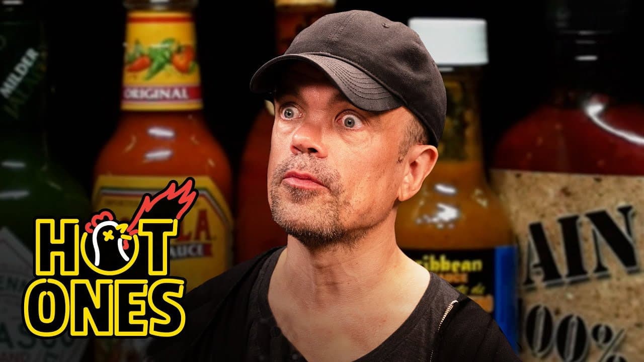 Peter Dinklage Breathes Fire While Eating Spicy Wings still