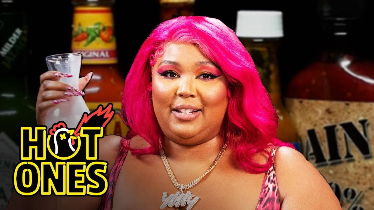 Lizzo Earns Her Hot Sauce Crown While Eating Spicy Wings still