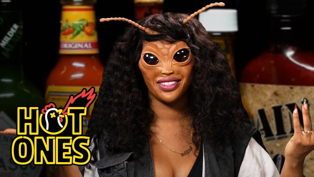 SZA Bugs Out While Eating Spicy Wings still