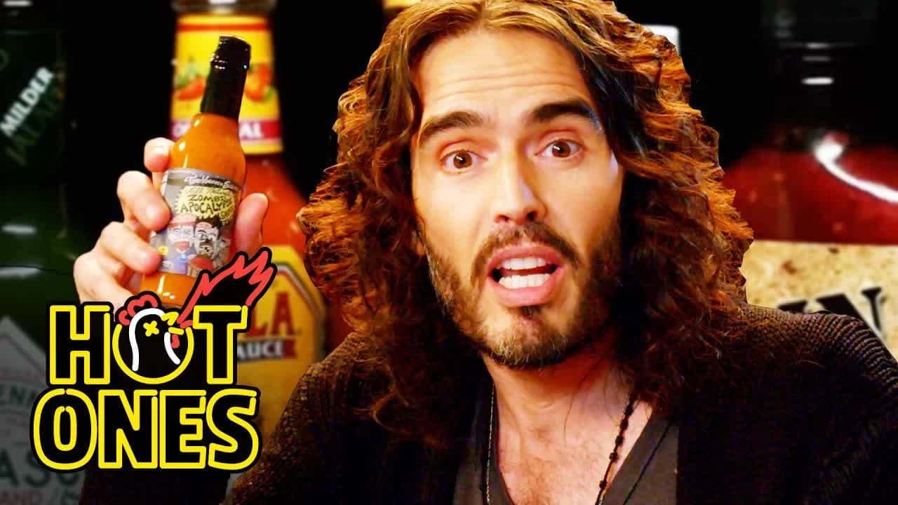 Russell Brand Achieves Enlightenment While Eating Spicy Wings still