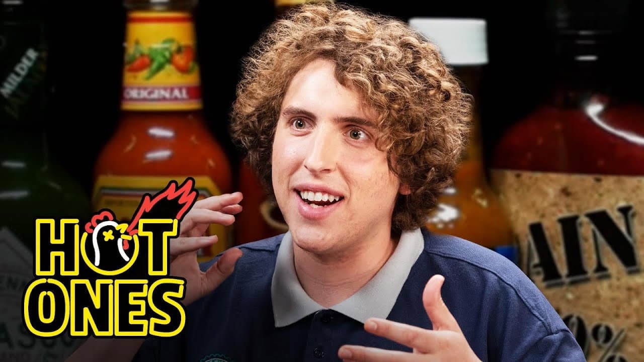 Andrew Callaghan Goes for the Marrow While Eating Spicy Wings still