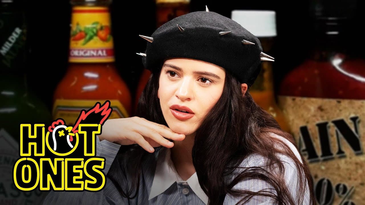 Rosalía Can't Stop Laughing While Eating Spicy Wings still