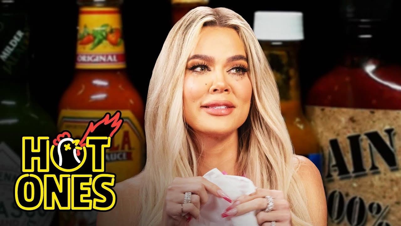 Khloé Kardashian Holds Back Tears While Eating Spicy Wings still